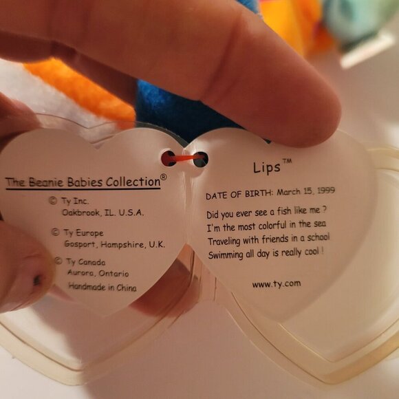 "Lips" the Fish is a colorful Ty Beanie Baby, released in 1999. Its vibrant oran - Picture 3 of 4
